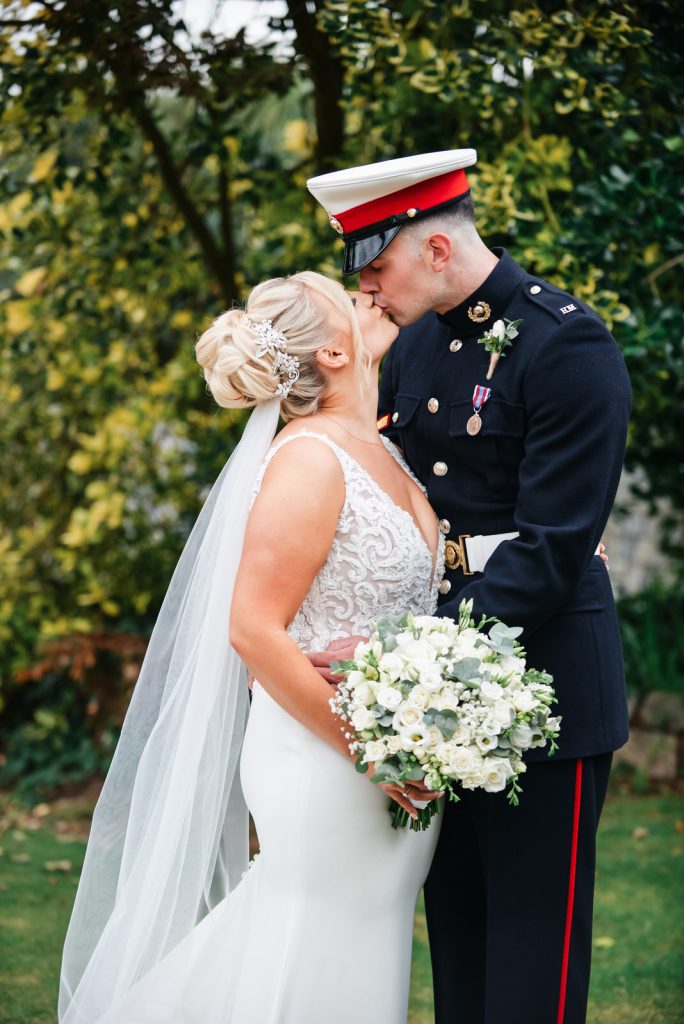 Wedding couple kissing at The Green Cornwall captured by Memories &amp; Milestones Photography