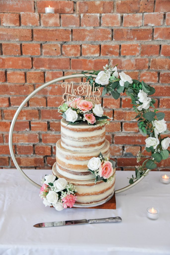 Wedding cake display at The Green Cornwall captured by Memories &amp; Milestones Photography