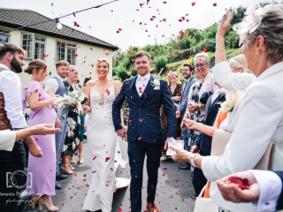 Bickley Mill wedding photographer_-2 Bride and groom walking through confetti at Bickley Mill captured my Memories & Milestones Photography