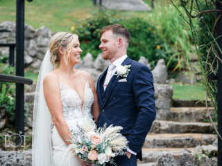 Bickley Mill wedding photographer_-3 Bride and groom in a releaxed pose looking at each other in the garden at Bickley Mill captured my Memories & Milestones Photography