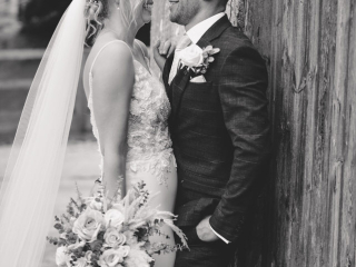 Bickley Mill wedding photographer_-4 Bride and groom leaning against a barn at Bickley Mill captured my Memories & Milestones Photography