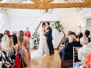 Bickley Mill wedding photographer_-5 Bride and groom kissing at their ceremony at Bickley Mill captured my Memories & Milestones Photography
